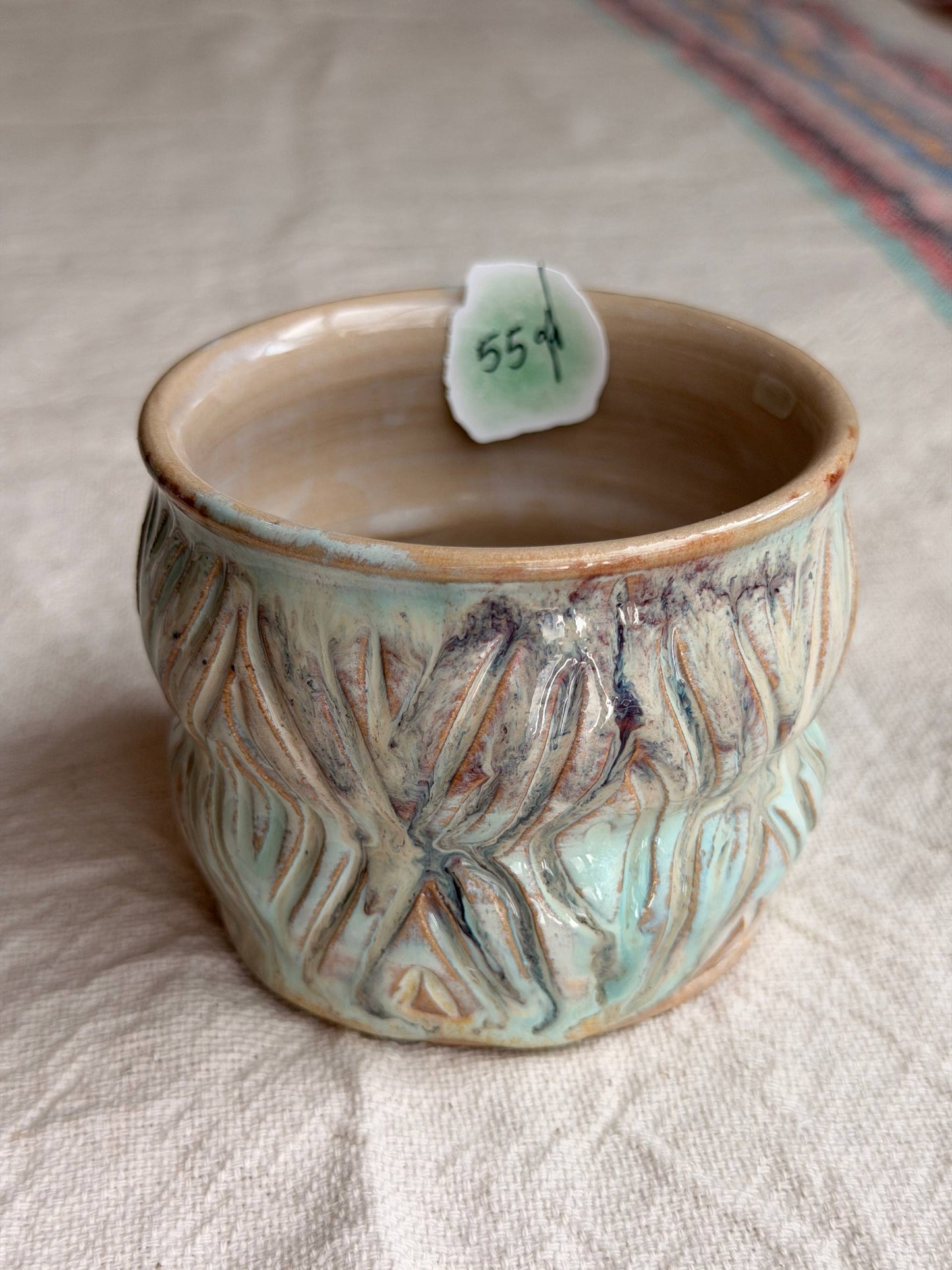 Handcarved mixed clay mug
